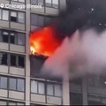 Massive fire engulfs high rise building in Chicago, USA