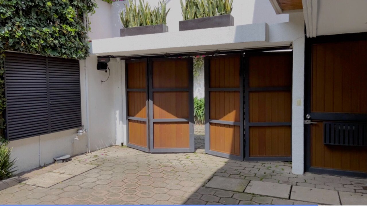 Should You Paint Your Front Door and Garage Doo...