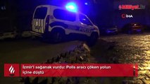 İzmir’i sağanak vurdu! Polis aracı çöken yolun içine düştü