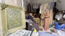 Mısır'da esnaf dükkanlarını Kuran ayetleri ile süslüyor
