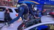Moment Tyre Nichols protestor smashes NYPD car windshield in Times Square