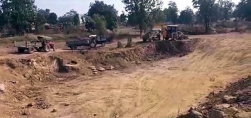 MNREGA works being done with JCB and tractors