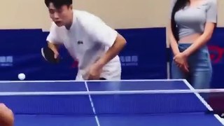 beautiful girl watching you playing table tennis