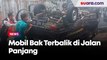 Diduga Rem Blong, Mobil Bak Pengangkut Air Mineral Terbalik di Jalan Panjang