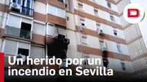 Un herido por quemaduras y fracturas en un incendio en Sevilla