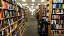 Walking through a used bookstore