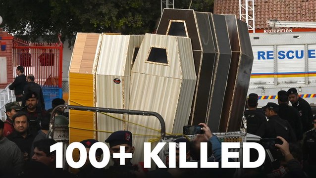 Suicide bomber kills at least 100 people in a heavily fortified mosque in Pakistan