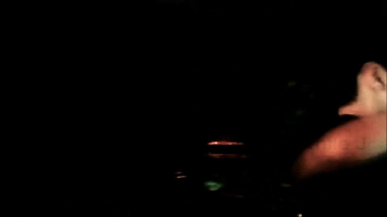 Christopher playing the wii while Jonathan & Anthony watch