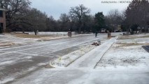Texans seen ice skating in suburban street as cold snap brings wintry conditions