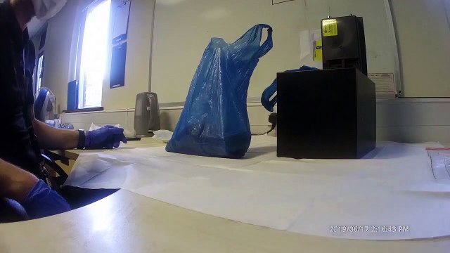 Police reveal cash and drugs found in drug dealers' safe