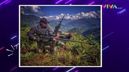 Sniper TNI Pantau KKB Lewat Ponsel yang Tersambung Teleskop