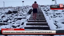 Profesyonel sporcu Hüseyin Nazlı, karlı havada Devegeçidi Barajı’na girdi