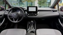 2023 Toyota Corolla SE Hybrid in Ruby Flare Pearl Interior Design
