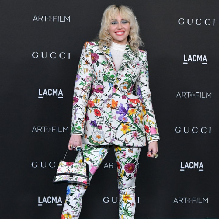 Miley Cyrus is 'the messenger' for her fans on Flowers