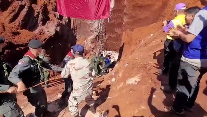 Moment toddler pulled from 50ft-deep well after 18-hour rescue mission in Thailand