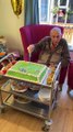 Wolves fan Frank Rhodes cuts football-themed birthday cake on 100th birthday