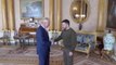Volodymyr Zelensky shakes hands with King Charles on surprise visit to Buckingham Palace