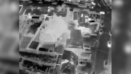 Police drone footage captures comical moment a bungling crook fell over a garden fence in a failed attempt to outrun officers