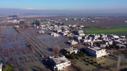 Village floods after quake causes dam collapse in Syria's Idlib province