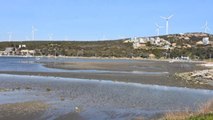 İzmir Seferihisar'da deniz suyu 25 metre çekildi