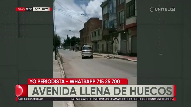 Calles llenas de huecos en transitada avenida en Ciudad Satélite en El Alto