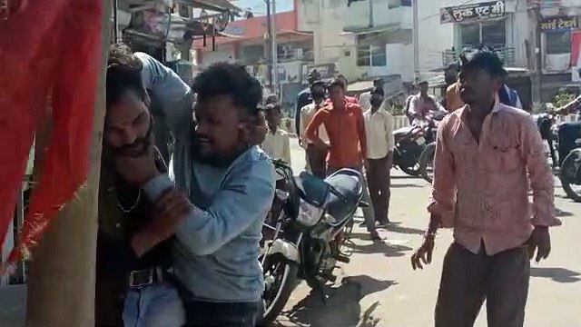 Miscreants created ruckus on the middle of the road, dragged and beat a young man