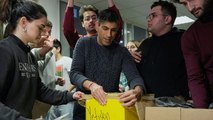 Rishi Sunak helps out volunteers at earthquake donation centre