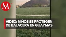 Menores son captados pecho tierra por balacera en Guaymas