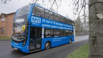 NHS double-decker bus touring the UK to raise awareness of the signs of cancer