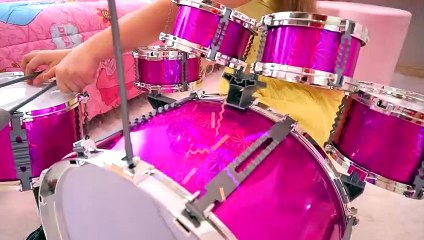 Diana and Dad in a Children's story about toy musical instruments