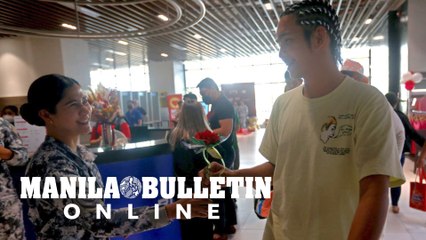 Philippine Coast Guard give flowers to passengers of PITX in celebration of Valentine's day