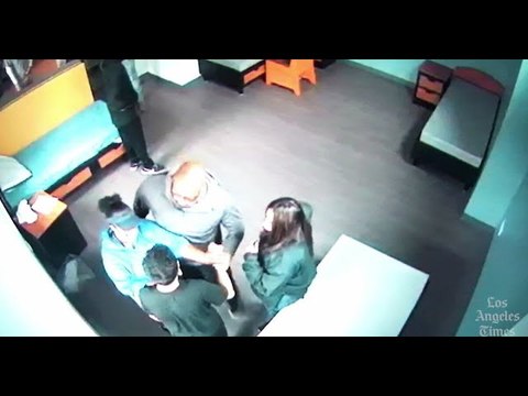 Video of probation officer forcibly bending teen sparks outrage