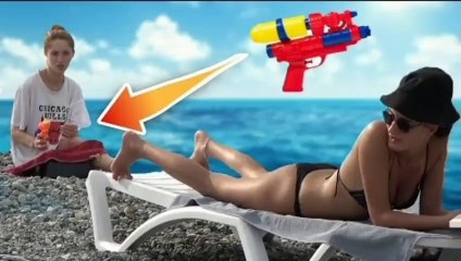 WATER GUN SPRAY PRANK   AWESOME REACTIONS