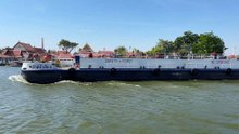 White Container ship sailing at  Koh Kret in Nonthaburi Thailand