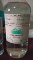 Botella de tequila Casamigos , sirviendo un poco para brindad con todos los contactos de las redes sociales en el dia de el amor y la amistad