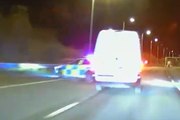 Moment police car rammed off motorway at 70mph