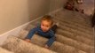 'It's safe and it's FUN!' - Baby boy slides down the stairs on his tummy