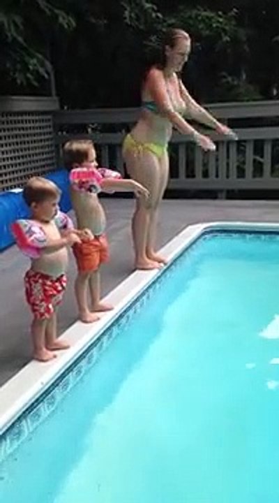 Child Does a Spectacular Belly-Flop into the Pool