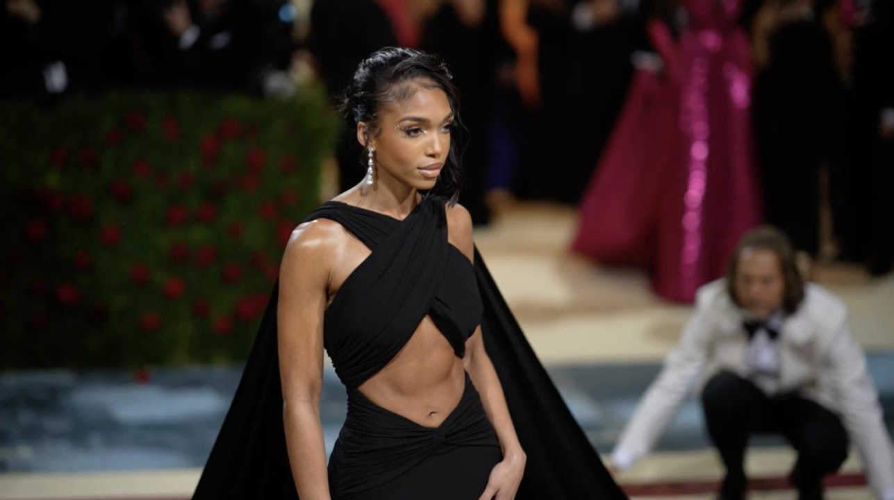 Lori Harvey Sat Front Row at New York Fashion Week in an Ultra-Sheer Top and a Chiffon Skirt