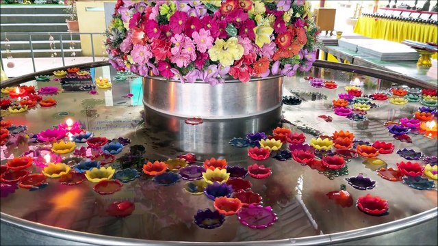 Spinning candles at wat Wat Sao Thong Thong Koh Kret Thailand