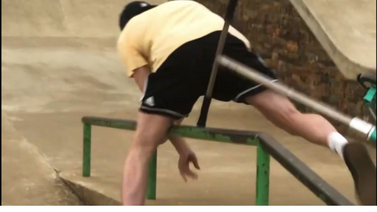Scooter rider eats dirt after rail stunt takes a costly wrong turn