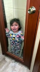 Girl Gets Stuck Between Door and Blinds