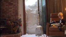 Supermom takes down ginormous snow wall on balcony so her son could enjoy a beautiful view