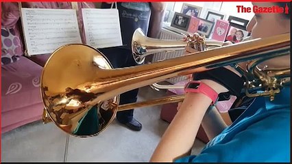 Kind-hearted siblings earn rare Blue Peter badge for playing music to dementia patients