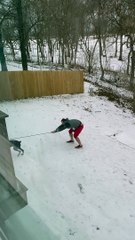 Man Struggles to Escape Slippery Yard