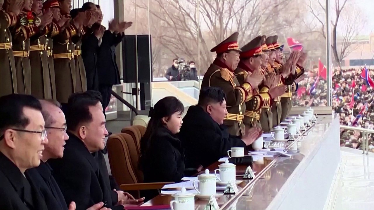 Kim Jong Un and 'beloved child' watch soccer game