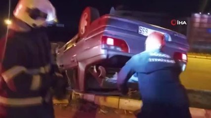 Refüje çarpan otomobil takla attı: 2 yaralı