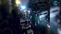 Los vecinos de Hatay corren mientras a su espalda se derrumban los edificios en Turquía