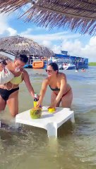 Friends Try to Keep Their Things From Floating Away