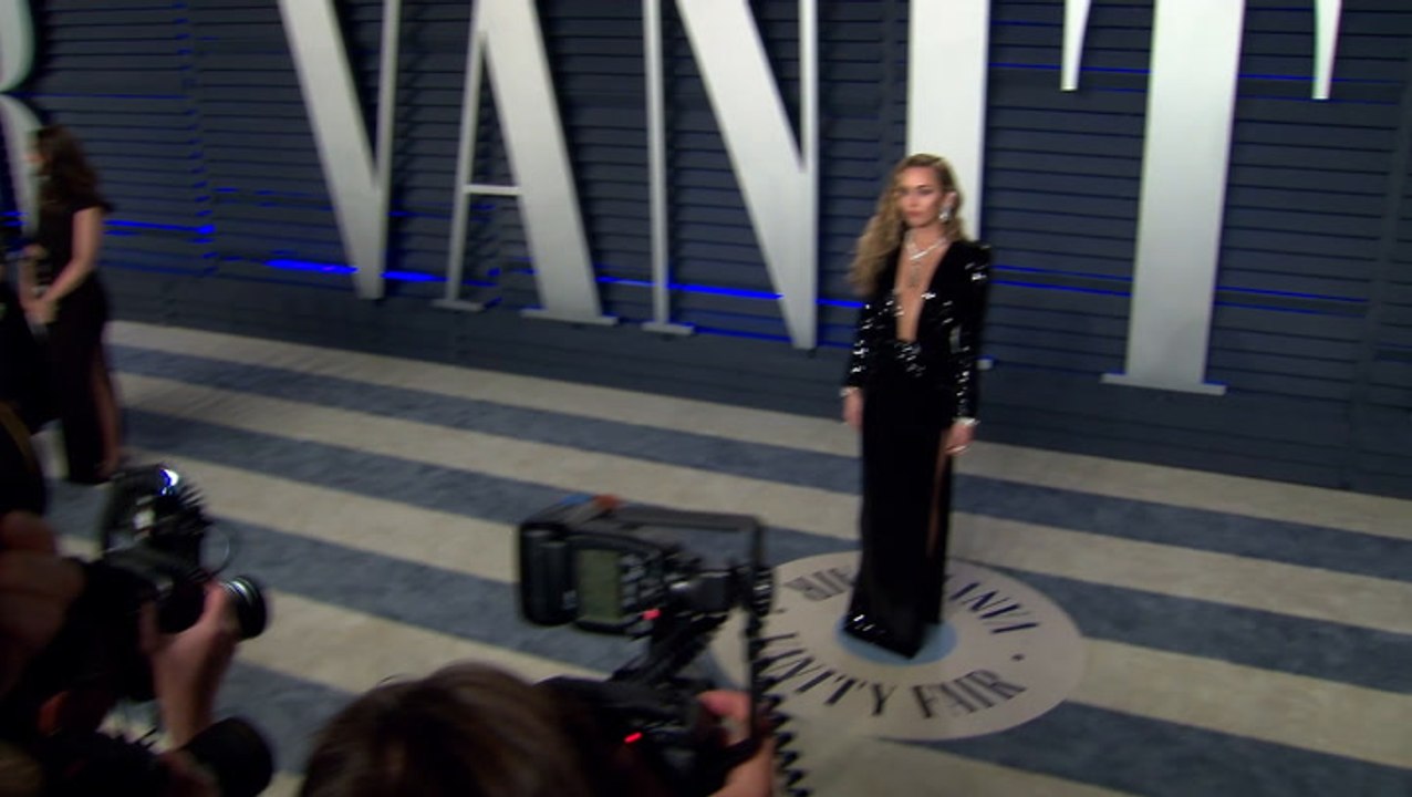 Miley Cyrus Stretches Her Body As She Rocks A Tiny Red Bikini In Sexy New Photo